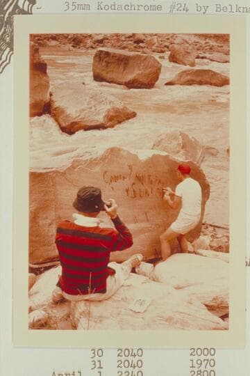 Dock Marston photographs Jorgen Visbak at the Best Expedition inscription at Rapid 16 in Cataract Canyon.  Best Wreck Rapid