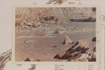 Harris-Brennan motorboat in Brown Betty Rapid.  Mile 212.  Cataract Canyon