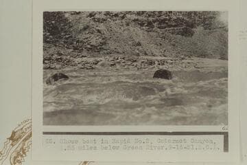 Ellsworth Kolb running USGS boat thru Rapid No. 2