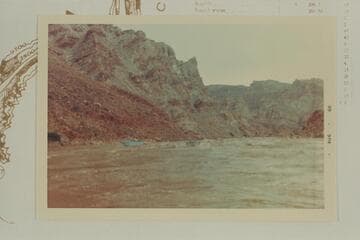 Down at Rapid #7, Mile 209.5, Cataract Canyon.  The Harris-Brennan boat at center appears to be attempting a run up the rapid