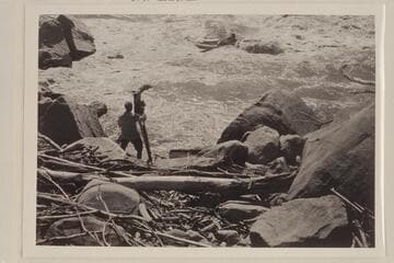 Emery Kolb photographing Ellsworth Kolb in Cataract Canyon during the USGS Cataract Canyon survey of 1921, Sep.  Lint album