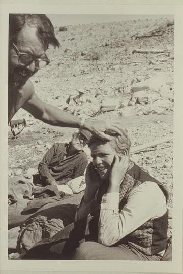 Frank LaRue making up Buzz Belknap for role in "The Colorado River Story."  Gods Pocket.  Ballard Atherton looks on