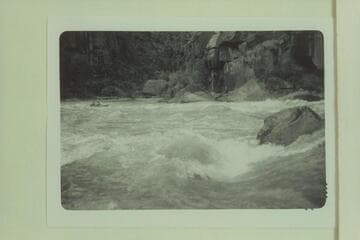 Mildred Davis pulling out below Triplett Rapid [on photo reverse:  Mildred's run completed.  Fern passenger]