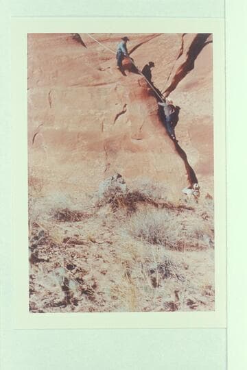 On the trail between the middle fork and the southwest fork--73.6.  Eisaman photographed Archeyes Masland going up the rope