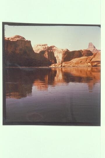 Mouth of side canyon at Mile 73.6, left bank, Glen Canyon.  View down river