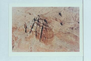 Butte at the end of the central part of the downriver finger of Cummings Mesa