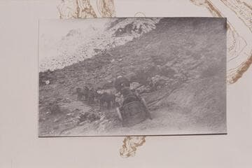 Trouble keeping rear end of boiler on the road.  Lees Ferry placer operations of the American Placer Corporation.  Copy of print in the Waller collection