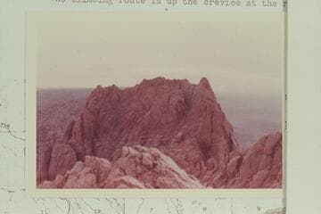 The South Echo Peak from the North Echo Peak. The climbing route is up the crevice at the right