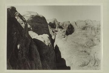 Southwest along the fault from the left side from about 1/2 mile from the point where it joins the northeast and middle forks of 73