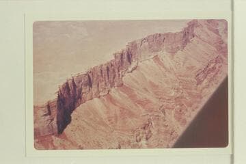 Right wall up river from upper end of cove above Cave Springs Rapid