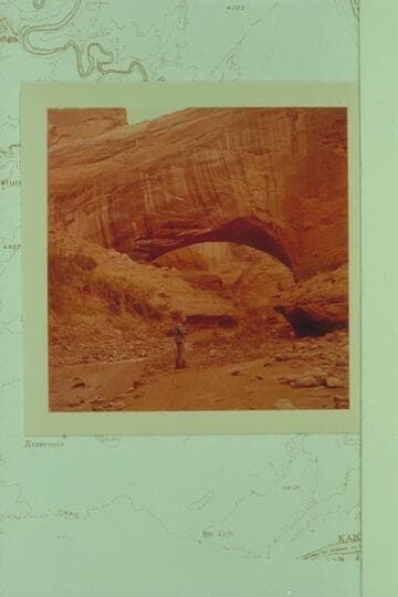 Herbert E. Gregory Natural Bridge.  Soda Gulch, Escalante River, upstream view.  Thompson in view
