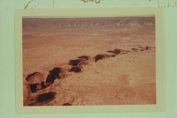 Up Coyote Gulch from near its mouth.  The Straight Cliffs and Fifty Mile Mountain at top