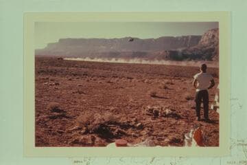The chopper follows the Bronco near the Soap Creek overlook