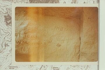 Inscriptions at the west side of Hance Canyon at the highest showing of the Tapeats Formation