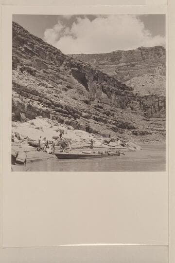 Replacing spray shields on the "Bootoo" and the "Cactus" after North Canyon Rapid had torn them off.  A change of loading so that more weight was aft reduced the amount of water which came over the boys