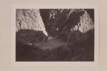 Holmstrom's boat moored in the cove above the suspension bridge; Mile 87.4 right bank