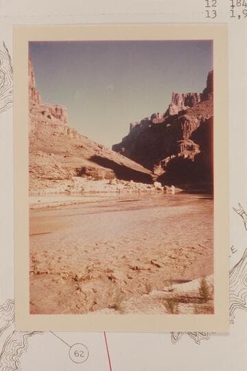 Up Marble Canyon from the mouth of the Little Colorado.  The flow at the bottom of the picture is the flood out of the Little Colorado which runs up Marble Canyon to meet the Colorado