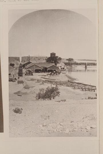 Shops of the Colorado Steam Navigation Company, Yuma.  The bridge was built about 1878.  Steamer "Gila" at the bank