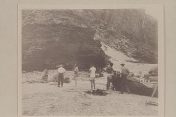 House-Rock Canyon camp.  Dinner.  Lucile Hiser; Wayne Hiser; Bestor Robinson; Nevills?  Garth Marston; Frank Wright.  The beach is covered at high River stages