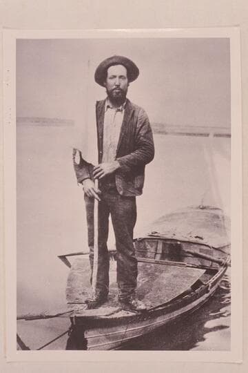 Charles Russell standing on the "Utah."  Needles