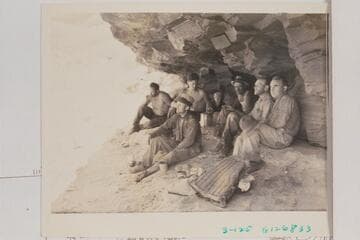 1934 crew in shade for lunch between 2-3 P.M. near Mile 75