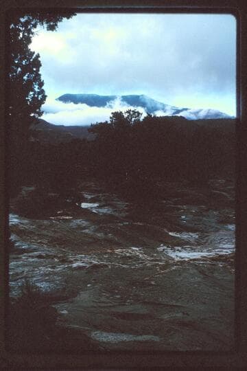 Navajo Mountain and storm from Trail Canyon