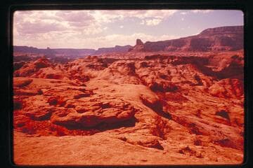 Across Anasazi Canyon down Glen Canyon from mesa north of Anasazi Canyon