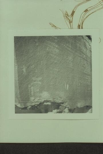 Petroglyphs at Mile 22 3/4, Green River.  South side of furthest rock from river