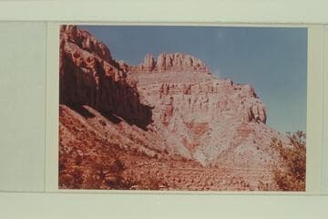 Apache Point from the Esplanade.  The trail is on the slide in center