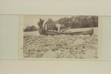 Pete Holt and Joe Evans with their inflated life preservers and the folding canvas canoe.  "For himself he had a blown-up football tied to the back of his belt" (p.53)