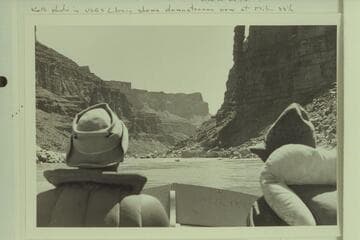 Bill Belknap driving the "Cactus" with Willie Taylor as they watch the lead boat drop through the rapid at Mile 23.3 (23-+, 22.85) in the Marble Gorge