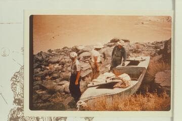 The "Ross Wheeler" on the talus at approximately Mile 107 left bank where it was left by Russell, Tadje, and Clement in 1914.  Waltenerg pulled it from the river with a Spanish Windlass