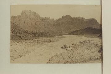 RB-MV Expedition walking their fold-flat boats down Piute Rapid