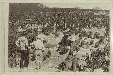 Visbak, Marston and Masland looking down at Navajo Mountain Trading Post, Utah
