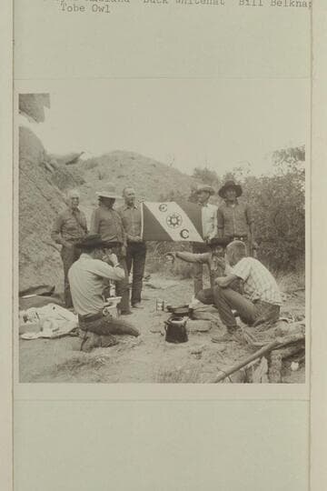 The exploration of the middle form [fork?] of 73.6 gets its official stamp.  Below:  Buster Ordiway; Dan Lehi; Christy Turner.  Above:  Archeyes Masland; Buck Whitehat; Bill Belknap; Tom Daly; Tobe Owl.  [Photo reverse:  Explorers flag]