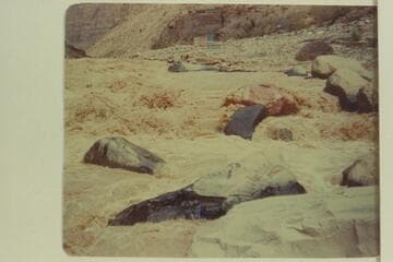 John Daggett entering Vulcan Rapid.  He is at the water line on right--"notice small figure--damn small."