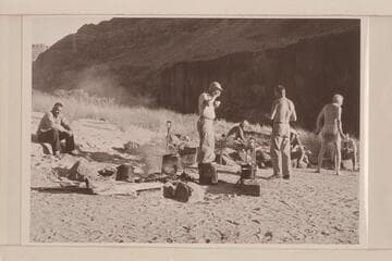Breakfast at camp at Mile 192.  Chet Bundy, Ballard Atherton, Josh Eisaman, Hugh Cutler almost hides  Rod Sanderson, and Joe Desloge hides Chuck Richey