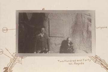 George Earley Harris, a teacher in Las Vegas Schools, and Mahlor Edwards, 10.  At the second Separation Plaque before removal to the higher location.  Supt. Edwards, of Boulder City Schools, was ill with a cold in a Bridge Canyon City tent