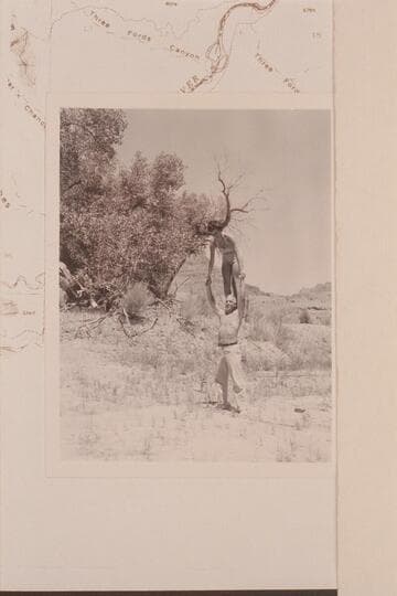 Maradel and Moulty Fulmer in a bit of horseplay.  Camp at Three Fords Canyon, right bank.  Mile 35 1/2