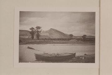 Buzz Holmstrom's boat at Green River, Wyoming, below the rail trestle where he started his solo run