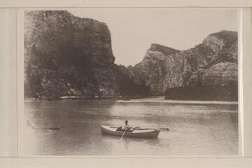 The Kolb boats on Green River.  Identified by Emery Kolb as Flaming Gorge.  The scene is below Flaming Gorge and just below Sheep Creek near the head of Hideout Park or Hideout Flat