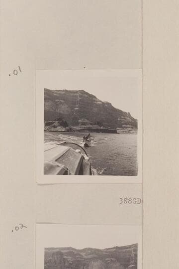 Nevills boats under tow and the crews standing in them for photos. Approximately the Grand Wash Cliffs on Lake Mead