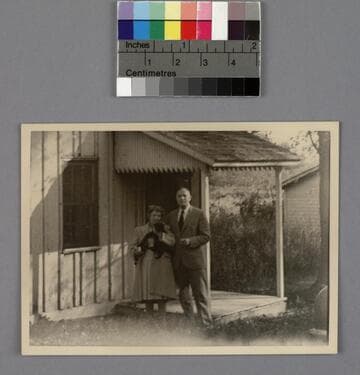 Grace Burke Hubble and Edwin Powell Hubble, outside their rental home on Spesutie Island, Aberdeen Maryland, 1945