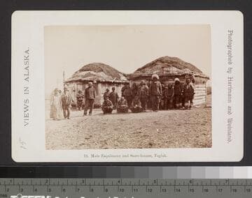16. Male Esquimaux and Store-houses, Togiak