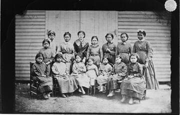 Group of Ottawa girls with teacher, near Shawnee, Oklahoma, Indian Territory