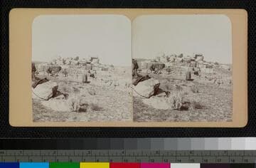 Cahuilla Indians attending to the graves at the cemetery at Cahuilla