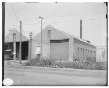 A street view of the "E" Street car barn of the San Bernardino Valley Traction Company