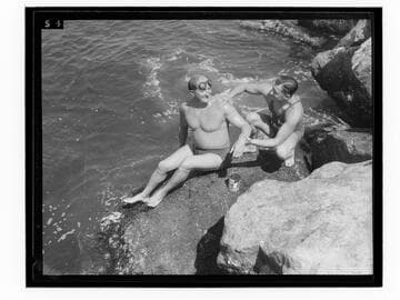 Lifeguard with swimmer, Santa Monica