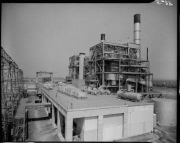 Profile shot across turbine deck at Etiwanda Generating Station with station boiler units on the right