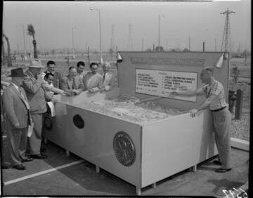 Tour group at Etiwanda Station reviewing relief map of Edison system
